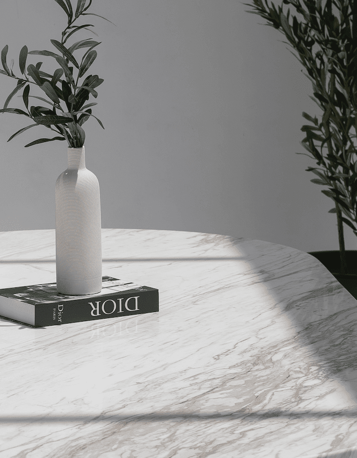 Ayla Greek Calacatta Marble Oval Dining Table With Black Marquina Base