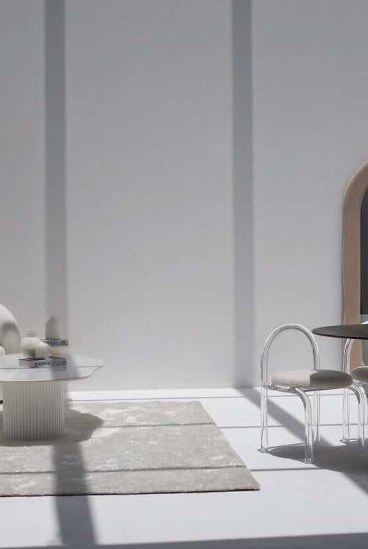 Cynthia Brown Dekton Dining Table with Travertine Base