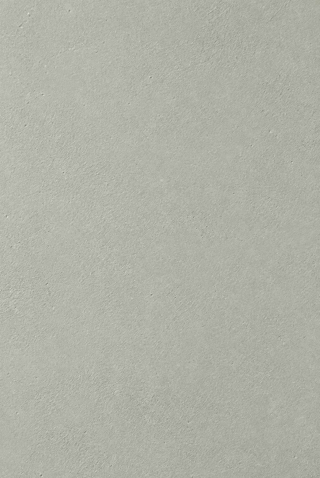Fiorenne pistachio green microconcrete round dining table closeup view