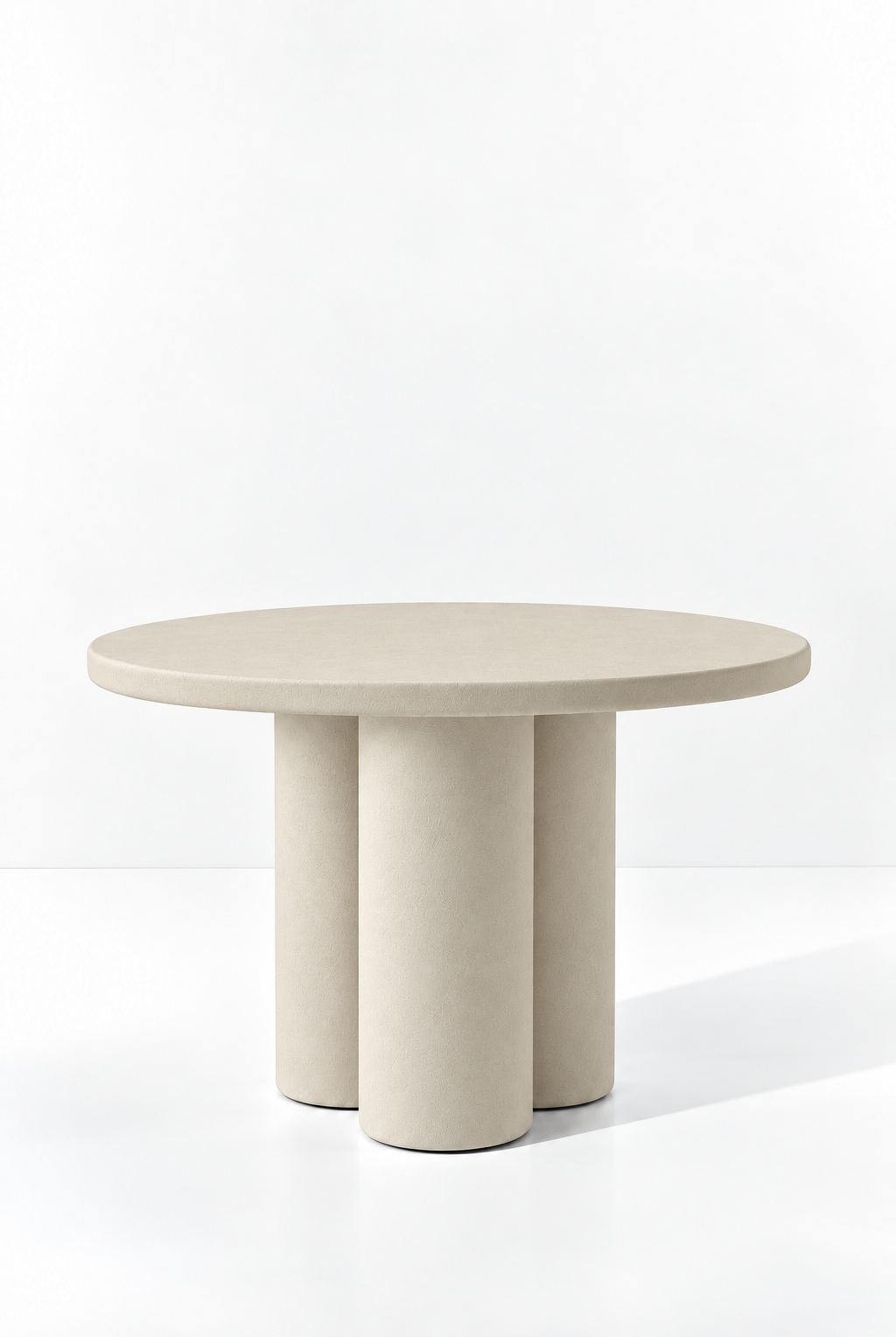 Olessa Light Beige Microconcrete Round Dining Table with three cylindrical supports