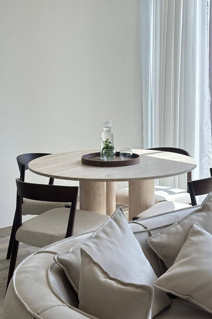 Thalassa Round Beige Travertine Dining Table with Three Legs