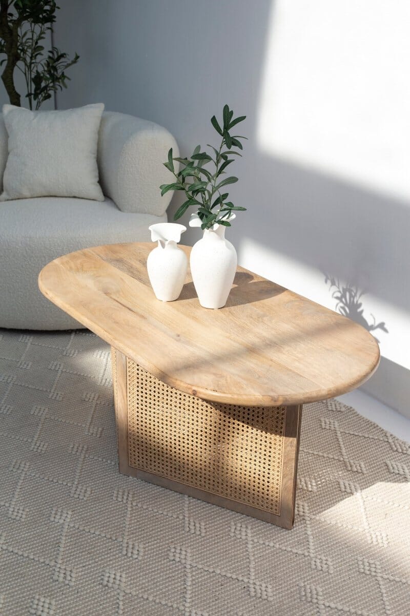 Baines Rattan Base Oval Wood Coffee Table