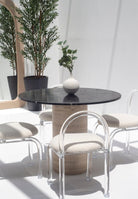 Irene Black Marquina Marble Dining Table with Travertine Base (2 Sizes) 