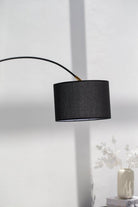 Contemporary Arching Floor Lamp with Sleek Black Shade 