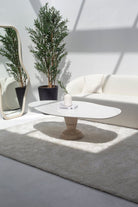 Berta Oval Irregular White Quartz Top Coffee Table with Solid Travertine Base Homekode 