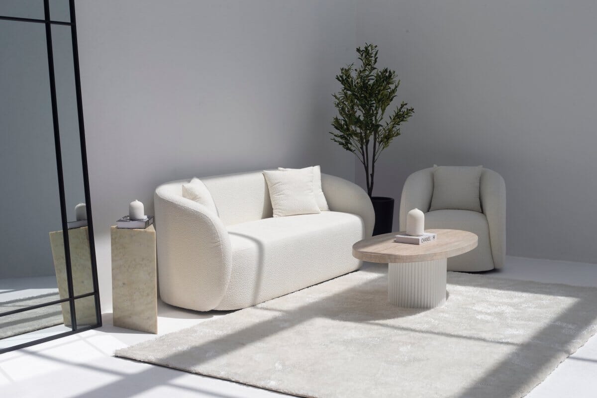 Melina Oval Travertine Coffee Table With White Base 