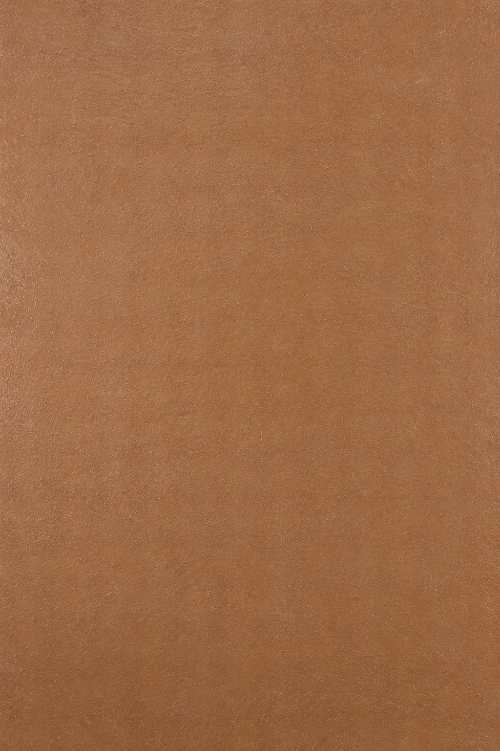 Fiorenne brown microconcrete round dining table closeup view
