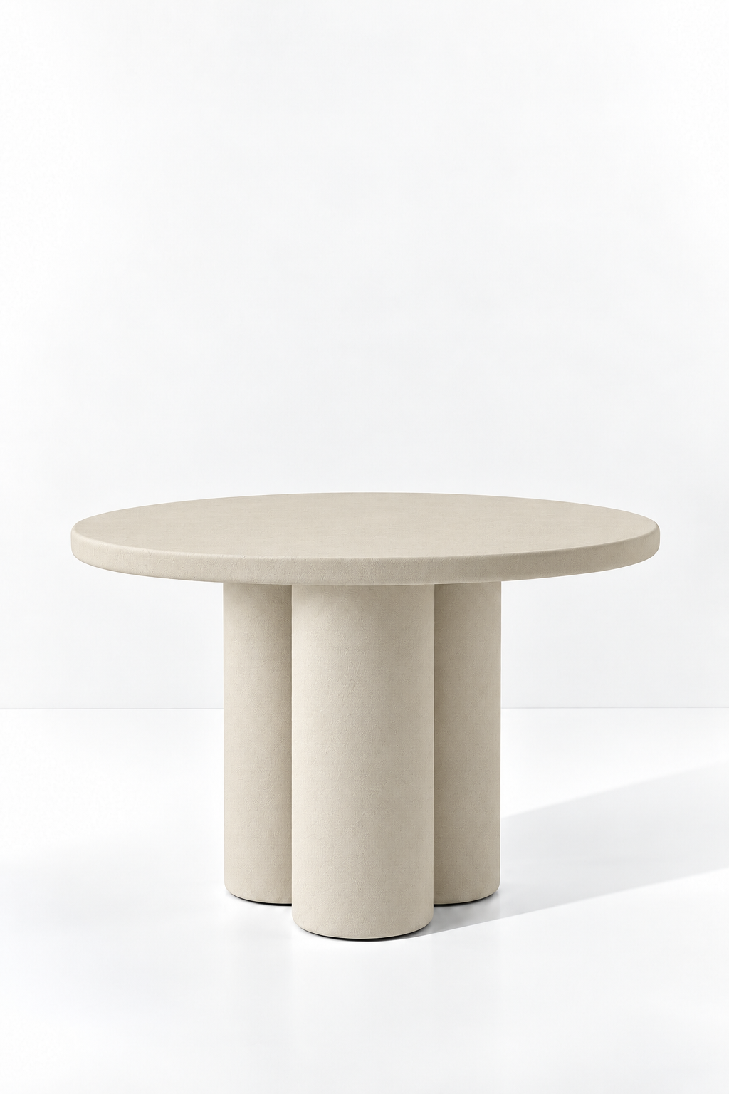 Olessa Light Beige Microconcrete Round Dining Table with three cylindrical supports