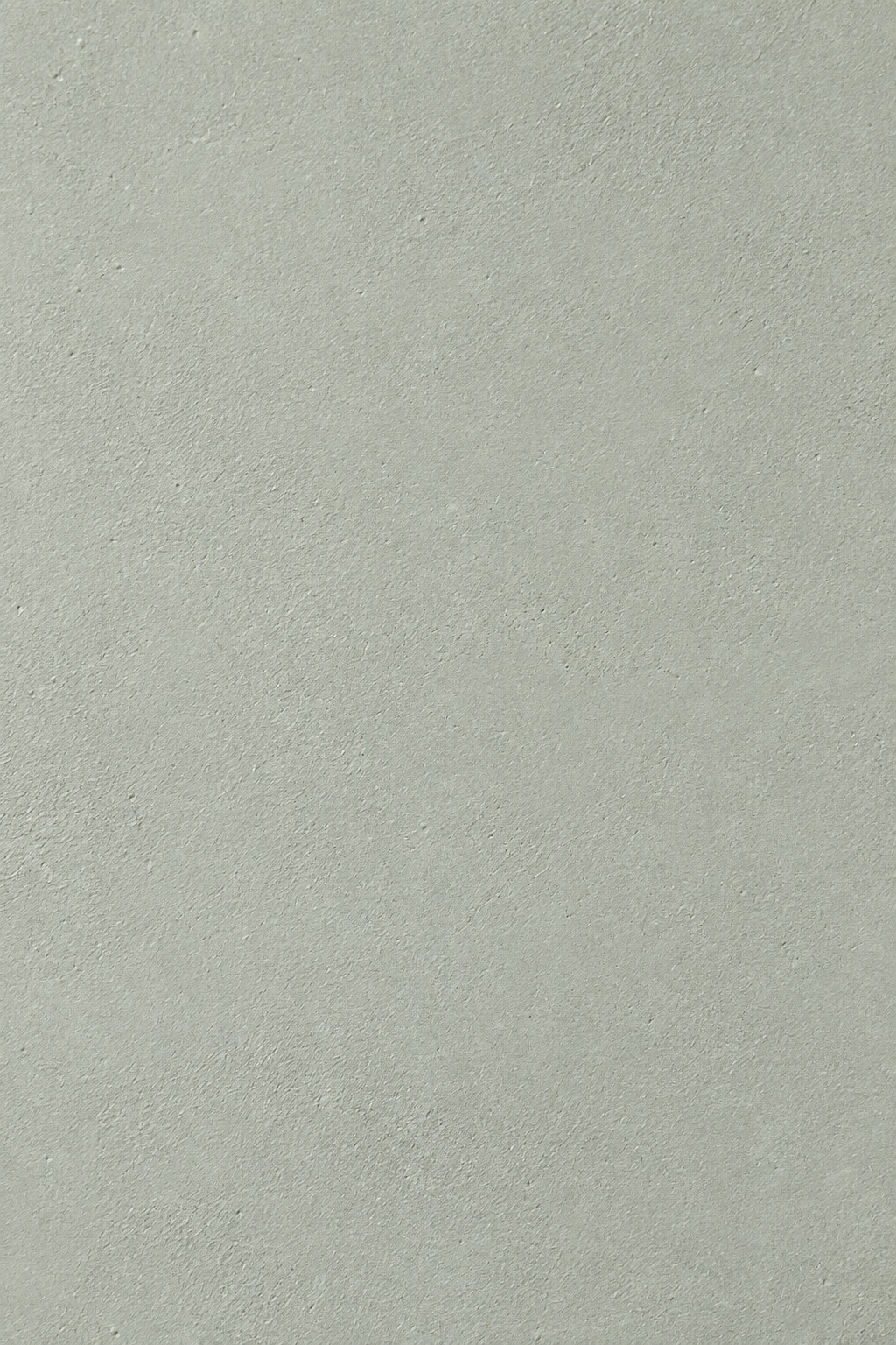 Tazira pistachio green microconcrete tabletop material closeup