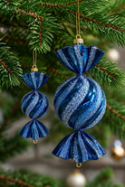 Blue glitter Christmas candy ornaments showing the two available sizes, sold individually
