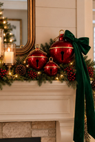 Red Christmas jingle bells with gold-toned trim and rope loops, each size sold separately