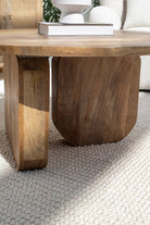 Haldor Wood Round Coffee Table With Cross Legs Coffee Tables 