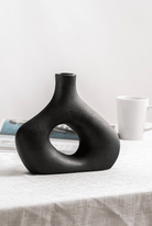 Black Ceramic Distorted Hollow Vase (23x20 CM)